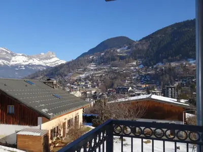 a building with balconies on the side of it at Apartment Les erables by Interhome in Saint-Gervais-les-Bains