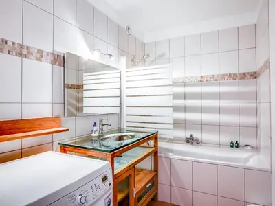two bunk beds in a dorm room with white walls at Apartment Fleurs des Alpes-1 by Interhome in Saint-Gervais-les-Bains