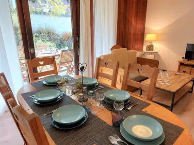a kitchen with a white refrigerator and a sink at Apartment Le Sporting-1 by Interhome in Saint-Gervais-les-Bains
