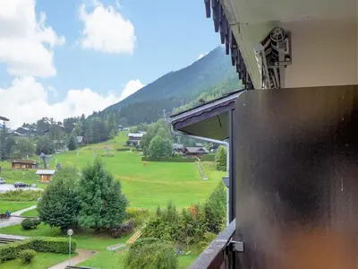 a bathroom with a sink and a shower at Apartment Clos du Savoy-23 by Interhome in Chamonix-Mont-Blanc