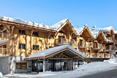 a lodge in the winter with snow on the ground at MGM Hôtels & Résidences - Résidence Chalets Elena in Les Houches