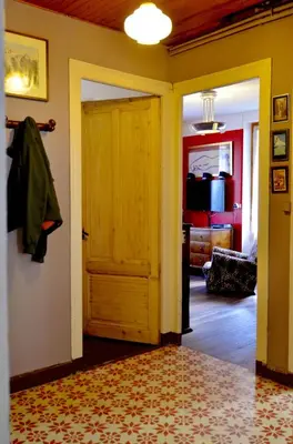 a hallway with an open door and a room with a room at DIFY Cosy - Chamonix in Chamonix-Mont-Blanc