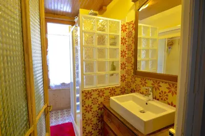 a bathroom with a sink and a mirror at DIFY Cosy - Chamonix in Chamonix-Mont-Blanc