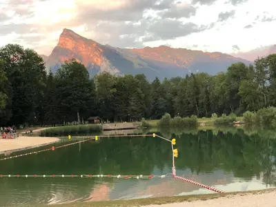 a pool of water with a mountain in the background at Giffre in Samoëns