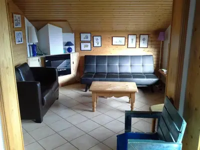a living room with a couch and a coffee table at Cordon Balcon Du Mont Blanc in Cordon