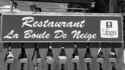 a sign that reads restaurant la boule de neiger at La Boule de Neige in Samoëns