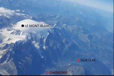 a view of a mountain with the words le mont blanc and our hat at Spacious and stylish flat at the foot of the Mont-Blanc ideal for ski in ski out in Les Houches