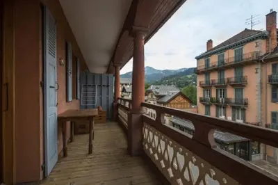 a balcony with a view of a city at Résidence Mont Joly2 in Saint-Gervais-les-Bains
