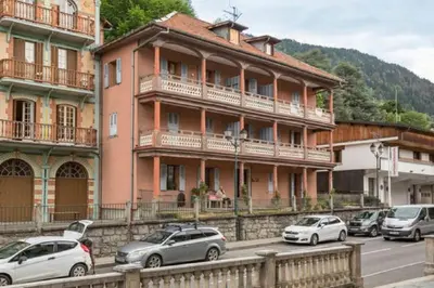 a group of cars parked in front of a building at Résidence Mont Joly2 in Saint-Gervais-les-Bains