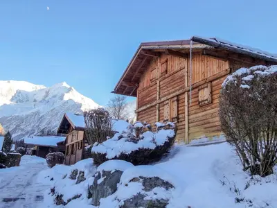 a wooden house on the side of a road at Holiday Home Les Farfadets by Interhome in Saint-Gervais-les-Bains