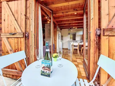 a kitchen with two chairs and a table in a room at Holiday Home Les Farfadets by Interhome in Saint-Gervais-les-Bains