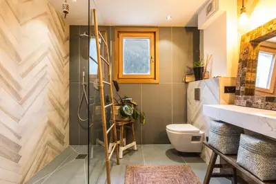 a bathroom with a shower and a toilet at Appartement Native in Chamonix-Mont-Blanc