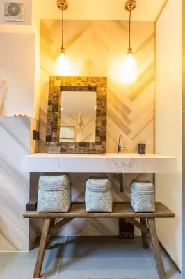 a bathroom with a sink and a mirror at Appartement Native in Chamonix-Mont-Blanc
