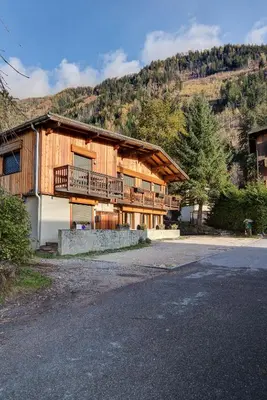 a large building with a balcony on the side of it at BIOLAY 2 - Alpes Travel - Central Chamonix - Sleeps 4-6 in Chamonix-Mont-Blanc
