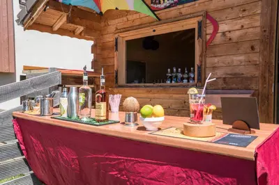 a table with food and drinks on top of it at Village De Vacances Les Flocons Verts in Les Carroz d'Araches
