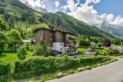 a building in the middle of a mountain at Blaitiere 2 Apartment in Chamonix-Mont-Blanc
