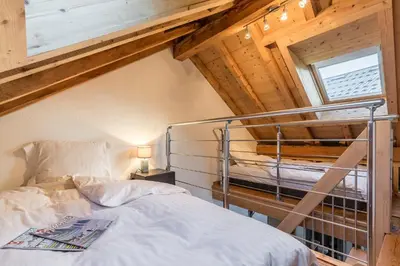 a room with a view of a snow covered yard at Les Edelweiss Mont-Blanc - Gîte Classé 3 Etoiles in Passy
