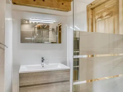 a bathroom with a sink and a mirror at Chalet 4 Chambres à Megève, 10 Pers, Calme, Wifi, Proche Centre - FR-1-453-1 in Megève