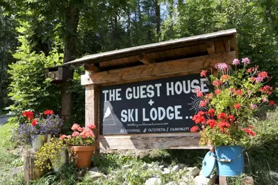 a sign for a guest house at a ski lodge at The Guest House in Vallorcine