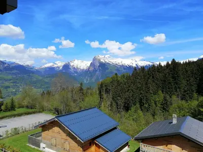 a table and two chairs on a balcony with a view at Appartement 2 pièces + cabine, 6 personnes, Morillon 1100, au pied des pistes - FR-1-815-63 in Morillon
