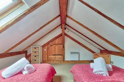 a bedroom with two beds in a attic at Chalet Heidi in Chamonix-Mont-Blanc