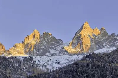 a group of mountains with snow on them at Chalet Heidi in Chamonix-Mont-Blanc