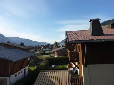a view of a town with mountains in the background at Appartement 3 chambres rénové à Megève - FR-1-453-6 in Megève