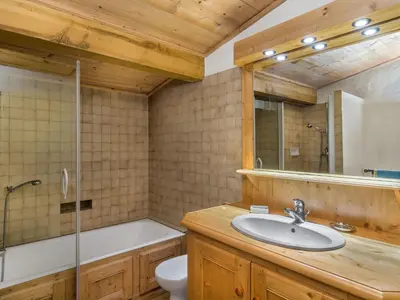 a bathroom with a sink and a shower and a toilet at Appartement 3 chambres rénové à Megève - FR-1-453-6 in Megève