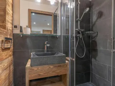 a bathroom with a sink and a shower at Appartement duplex 2 ch., terrasse, proche pistes à Megève - FR-1-453-26 in Megève