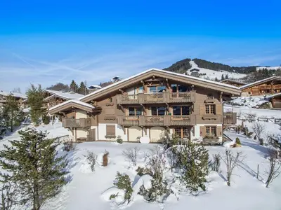 an image of a log home in the snow at Appartement 3 chambres Megève Sud avec Balcon et Wifi - FR-1-453-28 in Megève
