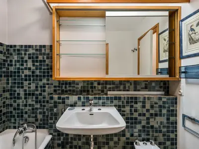 a bathroom with a sink and a mirror at Appartement 2 Chambres à Megève, Proche Pistes, WiFi - FR-1-453-32 in Megève