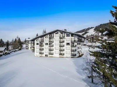 an aerial view of a building in the snow at Appartement 2 Chambres à Megève, Proche Pistes, WiFi - FR-1-453-32 in Megève