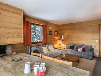 a living room with a couch and a table at Appartement 2 Chambres à Megève, Proche Pistes, WiFi - FR-1-453-32 in Megève