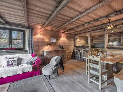 a living room with a couch and a table at Bel Appartement 3 Chambres à Megève, Terrasse, Wifi - FR-1-453-35 in Megève