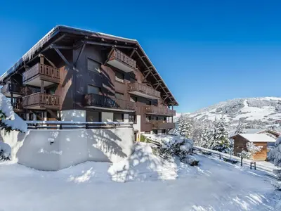 a building in the snow with a lot of snow at Appartement cosy 2 chambres avec wifi à Megève - FR-1-453-48 in Megève