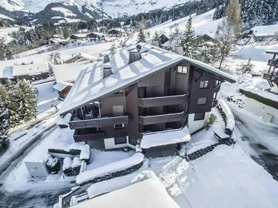 an aerial view of a house covered in snow at Appartement cosy 2 chambres avec wifi à Megève - FR-1-453-48 in Megève