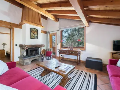 a living room with a couch and a table at Duplex 3 Chambres à Megève - Confort et Wifi - FR-1-453-49 in Megève