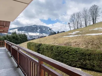 a porch with a view of a snow covered mountain at Appartement cosy avec mezzanine, parking, 4 pers., proche télécabine à Megève - FR-1-453-51 in Megève
