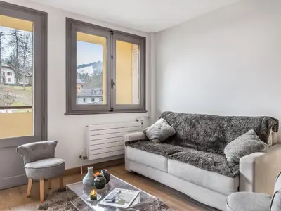 a living room with a couch and a table at Appartement central 2 chambres avec balcon et Wifi à Megève - FR-1-453-53 in Megève