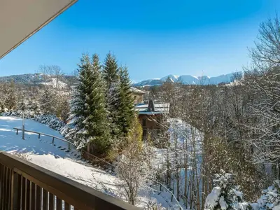 a winter view from the balcony of a house at Appartement 2 pièces à Megève, balcon au sud, proche centre - FR-1-453-54 in Megève