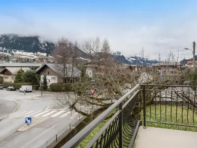 a view of a city from a balcony of a street at Appartement cosy à Megève, 1 chambre, parking, wifi - FR-1-453-59 in Megève