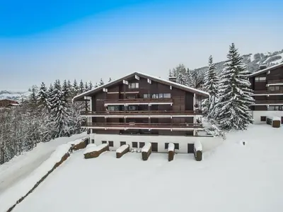 a lodge in the snow with snow covered trees at Appartement spacieux 1 chambre à Megève, balcon, parking inclus - FR-1-453-62 in Megève