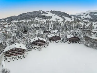 an aerial view of a resort in the snow at Spacieux T2 rénové avec Parking et WiFi à Megève, Proche Pistes - FR-1-453-68 in Megève