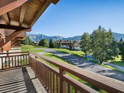 a view from the balcony of a house with a road at Appartement 3 pièces, 4 pers, Megève Mont d'Arbois, TV, Wifi - FR-1-453-76 in Megève