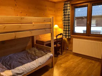 a bedroom with a bunk bed and a desk at Appartement 3 pièces avec balcon et wifi - Megeve Jaillet - FR-1-453-80 in Megève