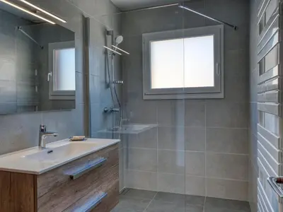 a bathroom with a sink and a shower at Appartement 3 pièces avec balcon et wifi - Megeve Jaillet - FR-1-453-80 in Megève