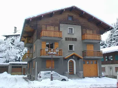 a large house with a balcony on top of it at Appartement confortable à Megève - Centre, 50m², 4 personnes, 3 balcons, TV et Wifi - FR-1-453-92 in Megève