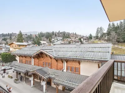 an overhead view of a building with metal roof at Appartement 2 chambres en centre-ville à Megève avec balcon et wifi - FR-1-453-107 in Megève