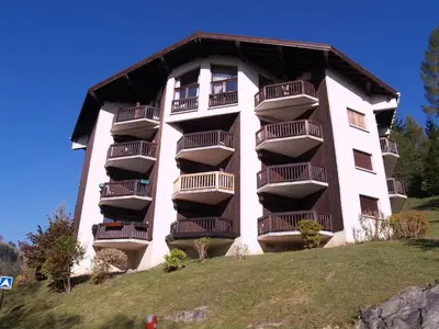 a building on a hill with balconies on it at Studio à Megève - 3 personnes, Animaux admis - FR-1-453-116 in Megève