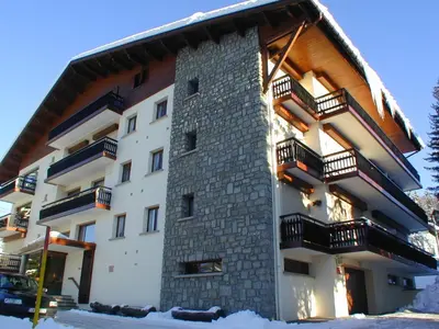 a building with balconies on the side of it at Charmant T2 au cœur de Megève pour 3 personnes - FR-1-453-106 in Megève